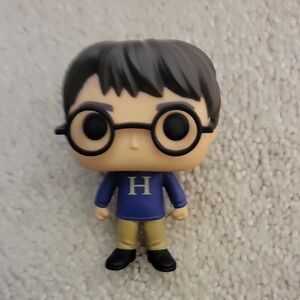Funko Action Figure with Blue and Black Outfit
